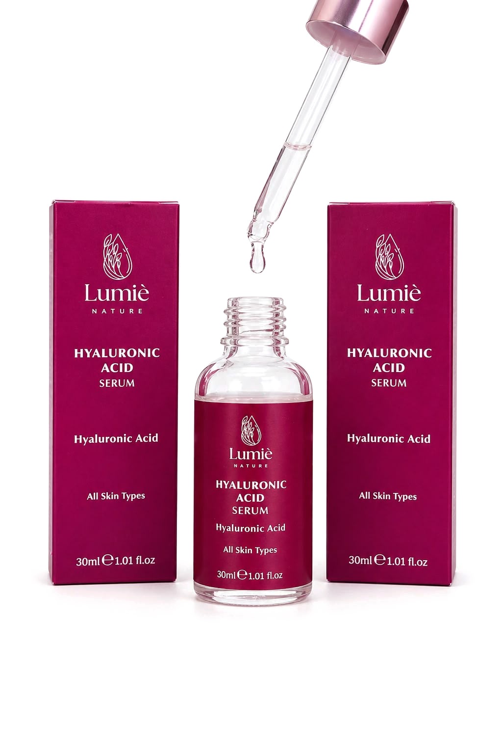 Damlalıktan damlayan Hyaluronic Acid Serum ve iki kutusu